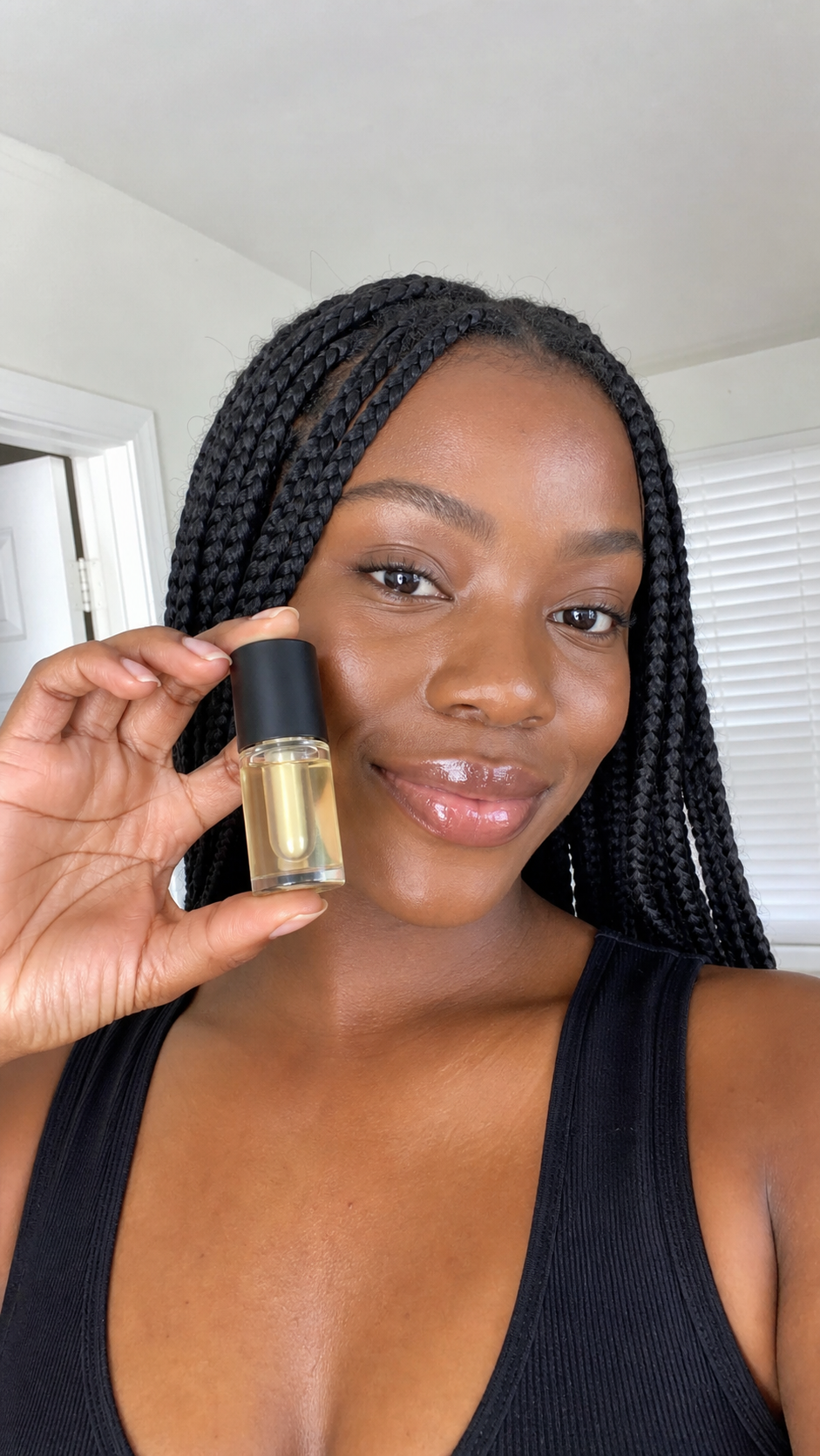 Customer showing long-lasting shine from Korean Spicy Lip Plumper Gloss
